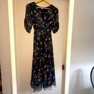 Size 10 Free People dress, empire style waist, tie back. Navy w/ butterflies.